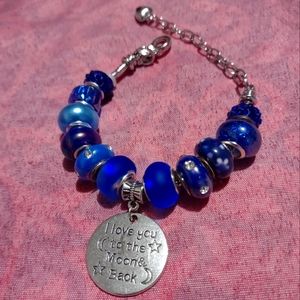 Silver snake chain charm bracelet with blue European beads